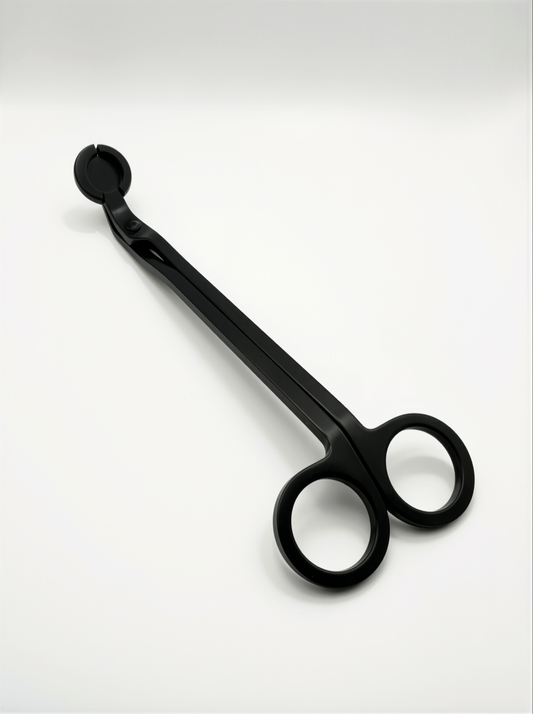 Black metal candle trimmers with curved handle on a white background